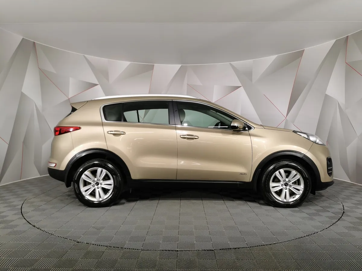 Kia Sportage 2.0 AT 4WD (150 л.с.) Luxe Коричневый в АВИЛОН. Слайд №6