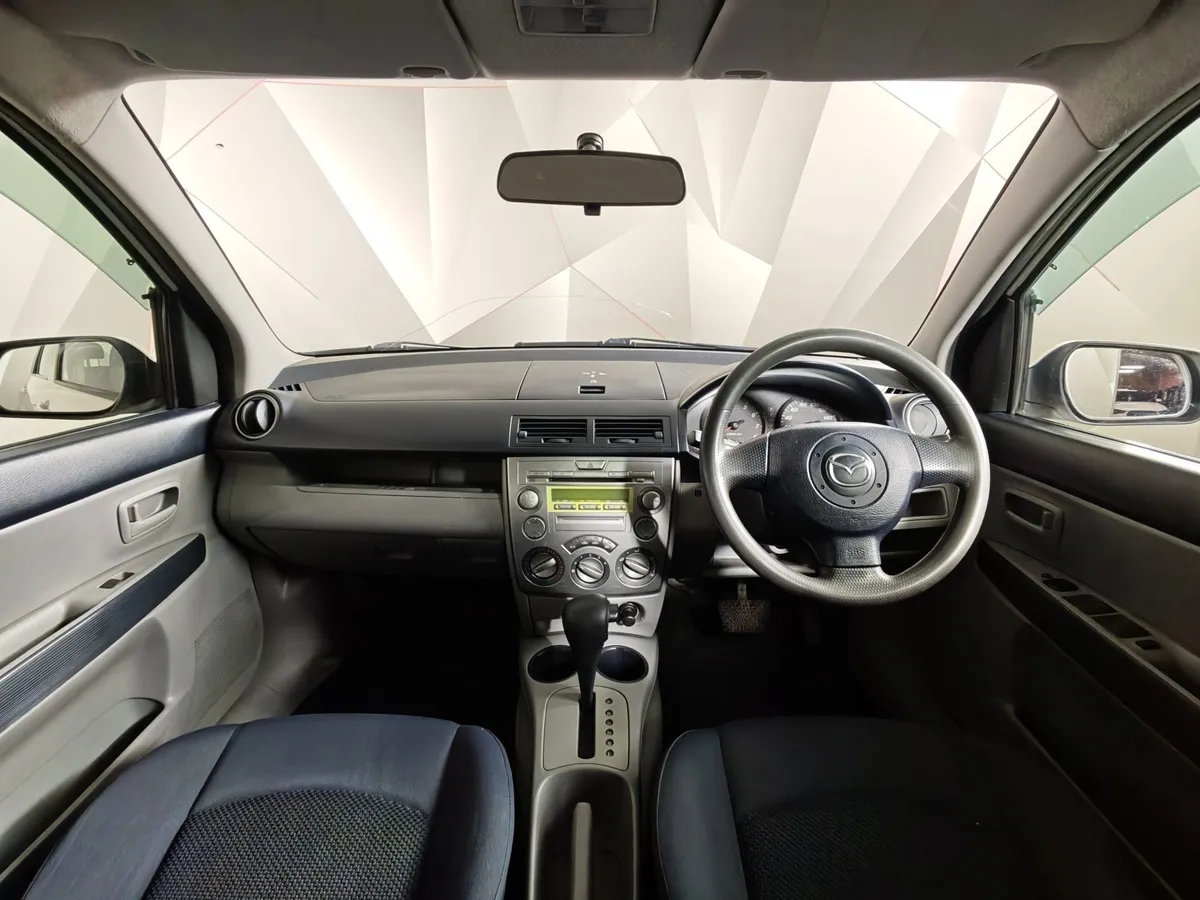 Mazda Demio 1.5 AT (100 л.с.) Белый в АВИЛОН. Слайд №12