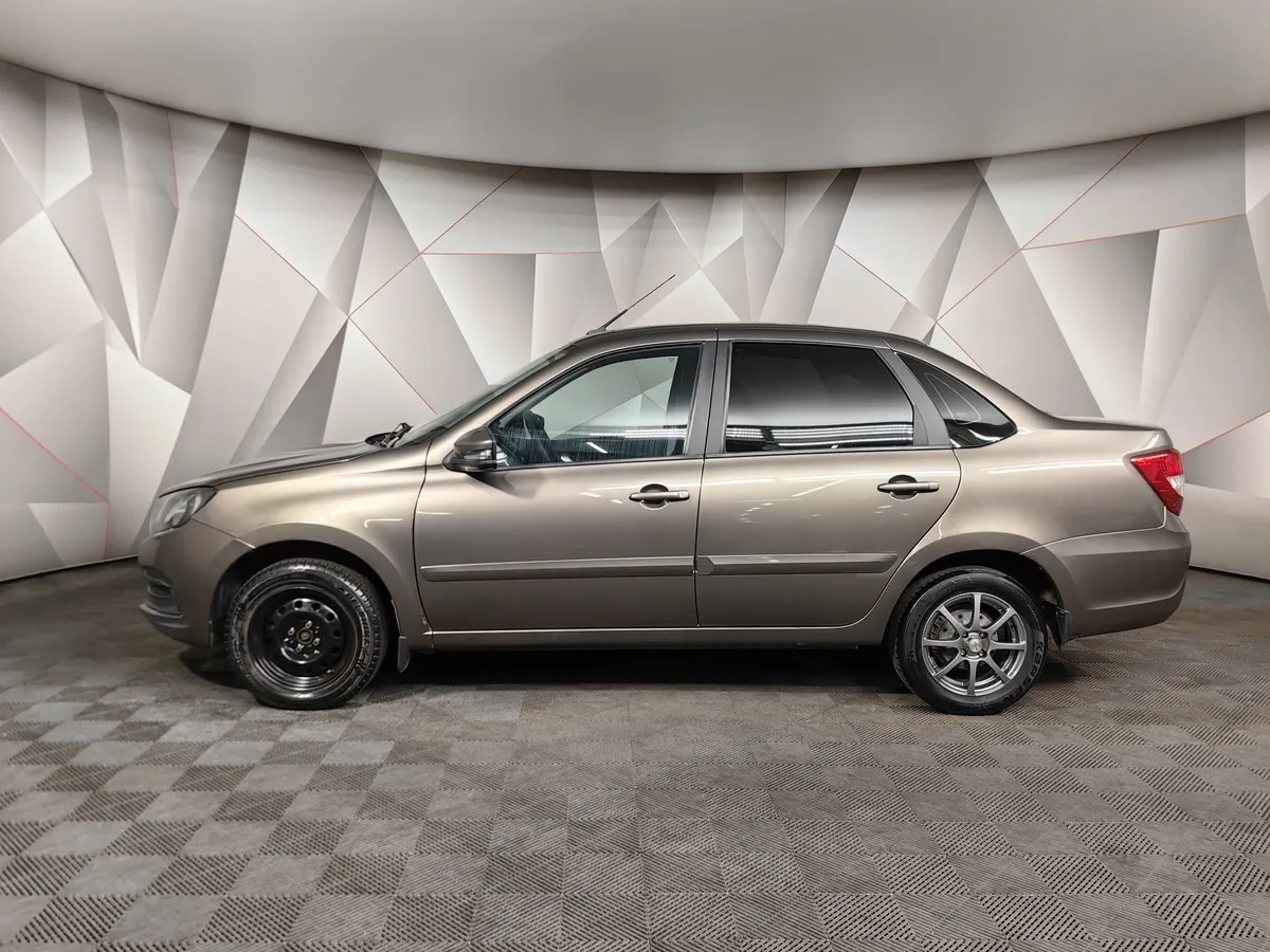 ВАЗ (Lada) Granta 1.6 MT 16 кл (106 л.с.) Коричневый в АВИЛОН. Слайд №5