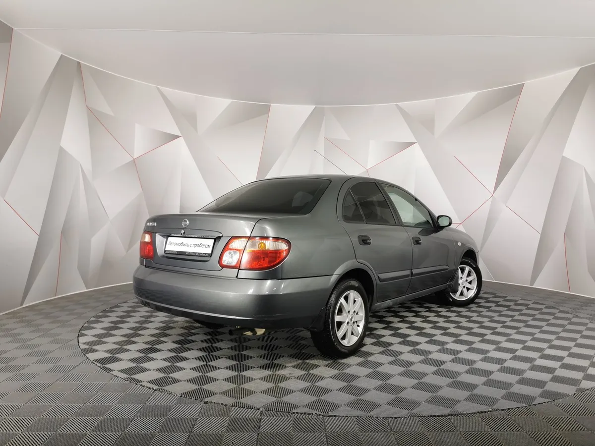 Nissan Almera 1.8 AT (116 л.с.) Серый в АВИЛОН. Слайд №2