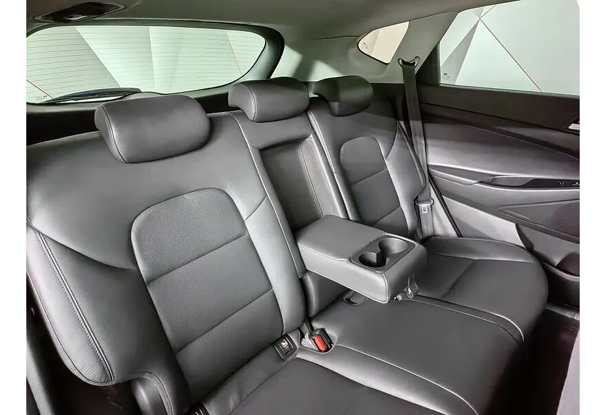 Hyundai Tucson 2.0 CRDi AT 4WD (185 л.с.) High-Tech Коричневый в АВИЛОН. Слайд №16