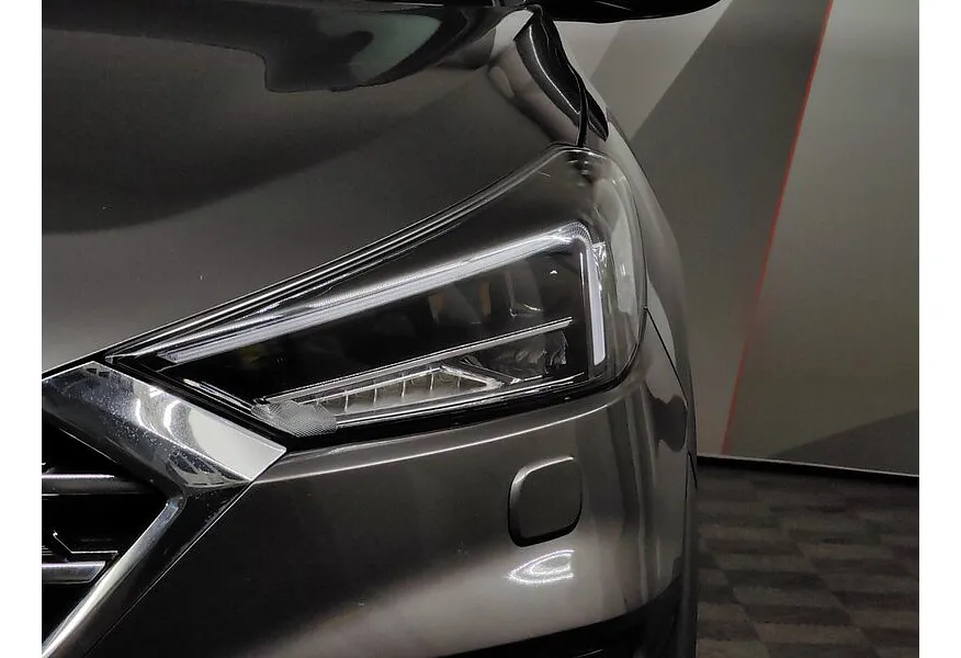 Hyundai Tucson 2.0 CRDi AT 4WD (185 л.с.) High-Tech Коричневый в АВИЛОН. Слайд №10