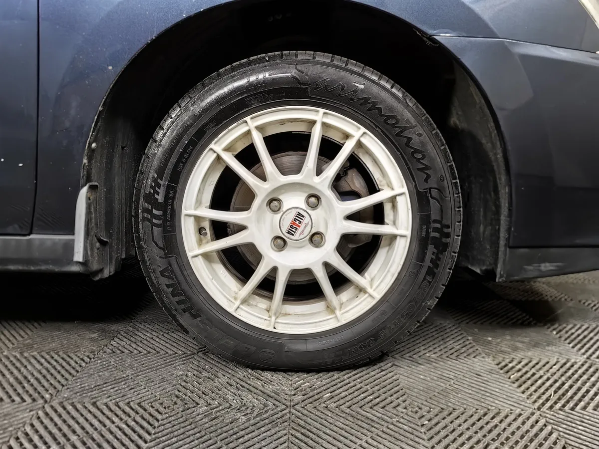 Nissan Almera 1.6 AT (102 л.с.) Comfort Серый в АВИЛОН. Слайд №9