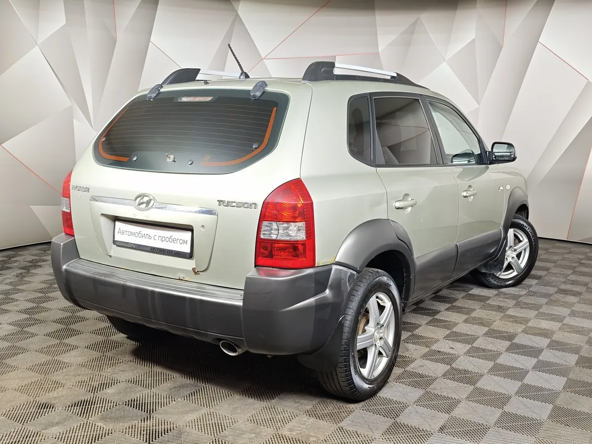 Hyundai Tucson 2.0 AT 4WD (142 л.с.) Серебристый в АВИЛОН. Слайд №2