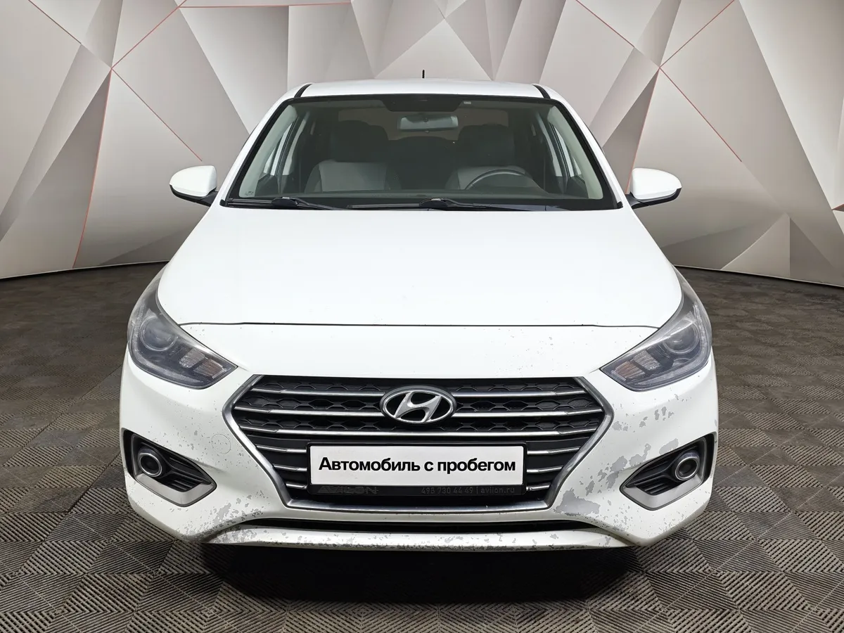 Hyundai Solaris 1.6 MT (123 л.с.) Elegance Белый в АВИЛОН. Слайд №7