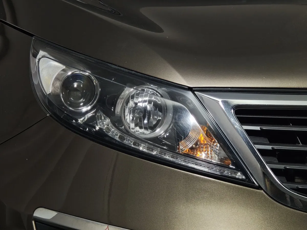Kia Sportage 2.0 AT (150 л.с.) Коричневый в АВИЛОН. Слайд №10