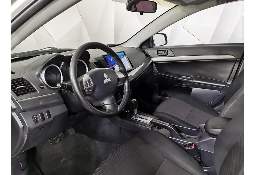 Mitsubishi Lancer 1.6 AT (117 л.с.) Серебристый в АВИЛОН. Слайд №19