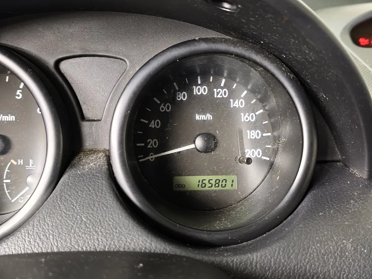 Chevrolet Aveo 1.2i MT (72 л.с.) Серебристый в АВИЛОН. Слайд №11
