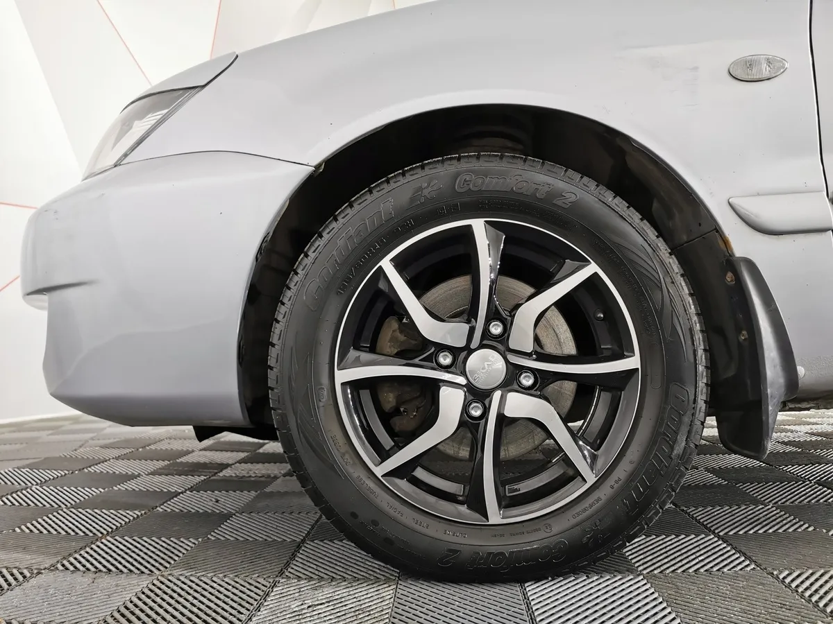 Mitsubishi Lancer 1.6 MT (98 л.с.) Серый в АВИЛОН. Слайд №9