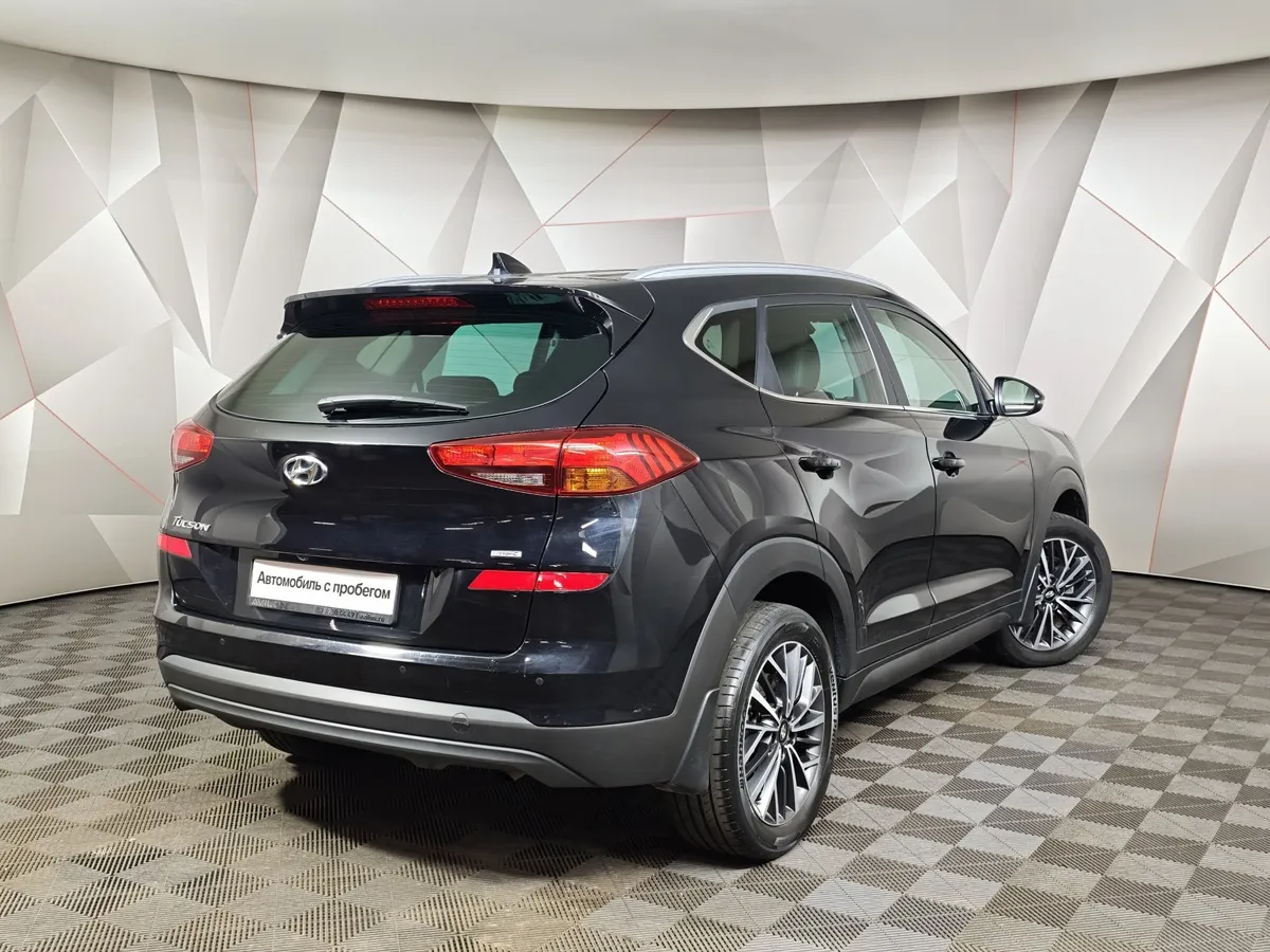 Hyundai Tucson 2.0 (150 л.с.) MPi-6AT-4WD Black & Brown Черный в АВИЛОН. Слайд №2