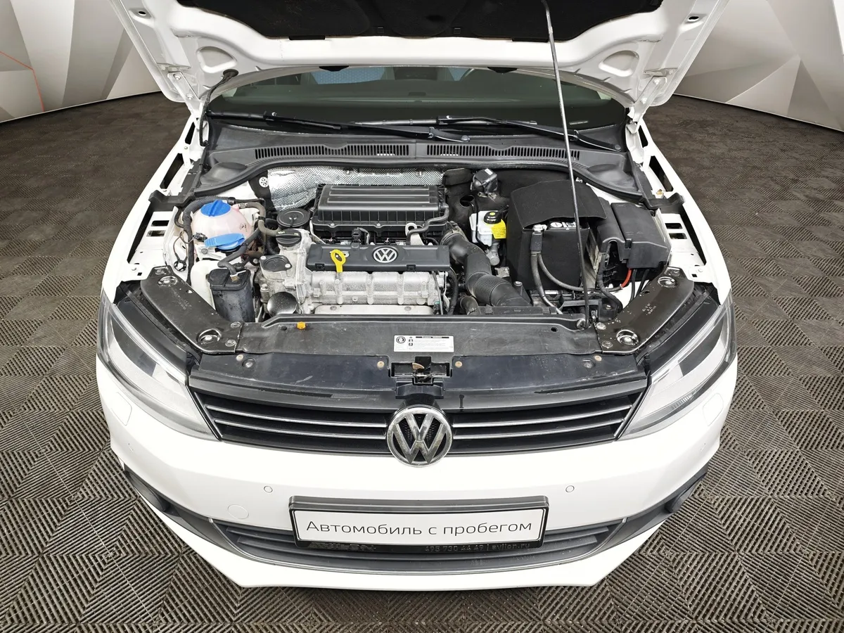 Volkswagen Jetta 1.6 MPI MT (90 л.с.) Trendline Белый в АВИЛОН. Слайд №10