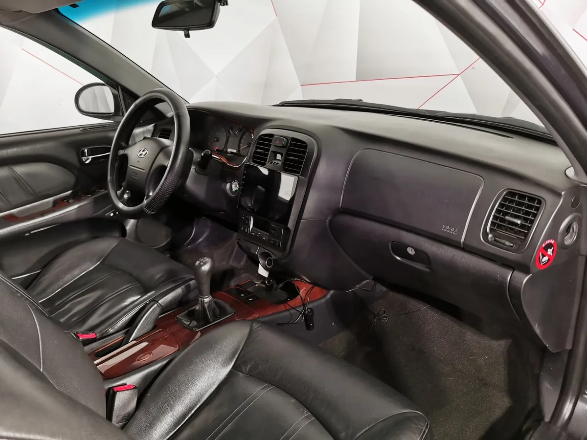 Hyundai Sonata 2.0 MT (137 л.с.) Черный в АВИЛОН. Слайд №12