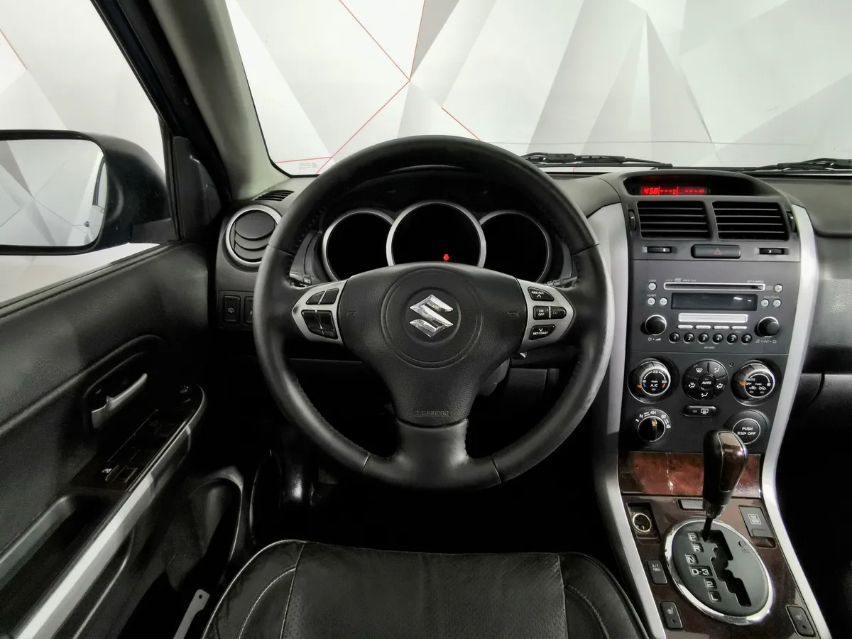 Suzuki Grand Vitara 2.0 AT (140 л.с.) Голубой в АВИЛОН. Слайд №17