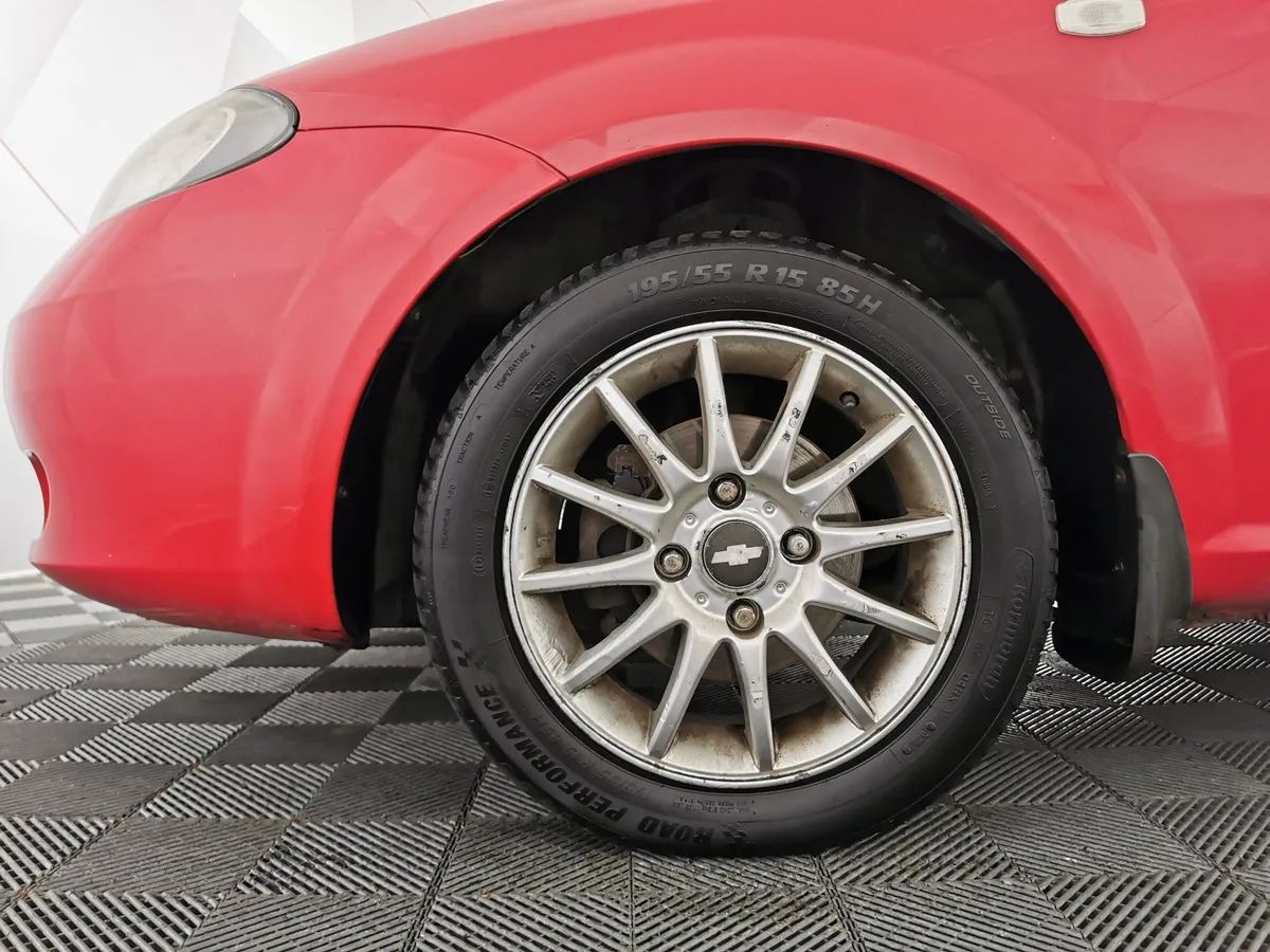 Chevrolet Lacetti 1.6 MT (109 л.с.) Красный в АВИЛОН. Слайд №9