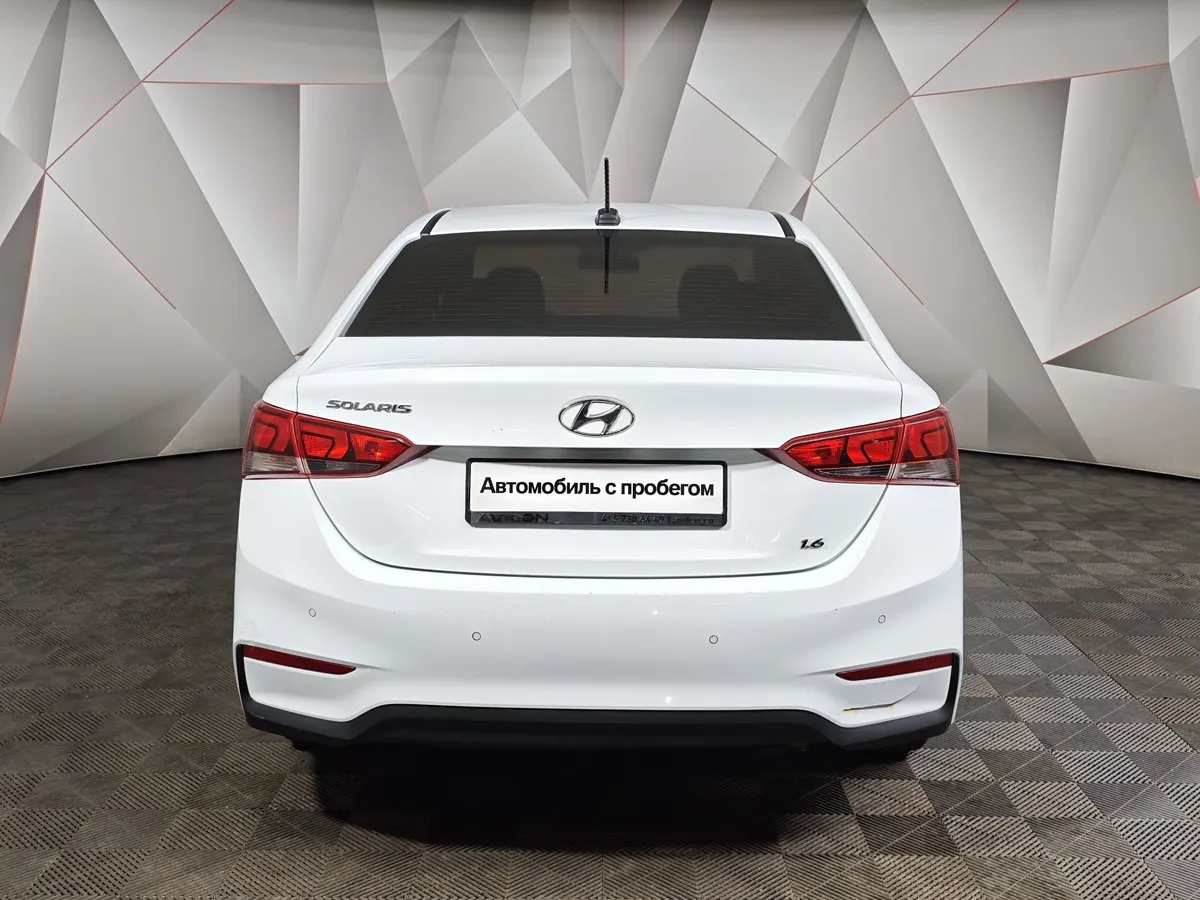 Hyundai Solaris 1.6 MT (123 л.с.) Elegance Белый в АВИЛОН. Слайд №8