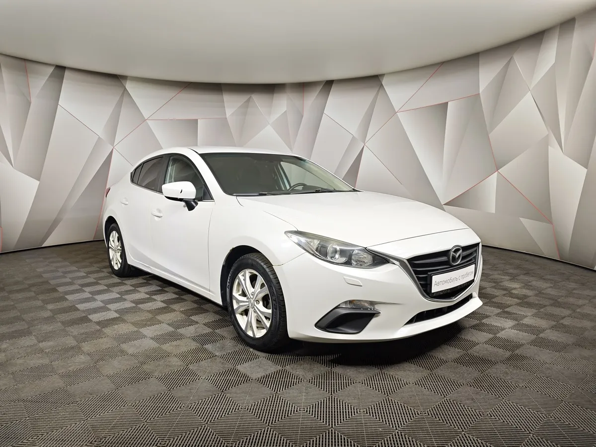 Mazda 3 1.6 MT (104 л.с.) Белый в АВИЛОН. Слайд №3