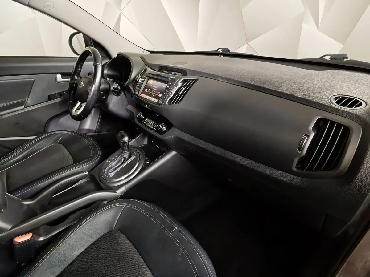 Kia Sportage 2.0 AT AWD (150 л.с.) Коричневый в АВИЛОН. Слайд №13