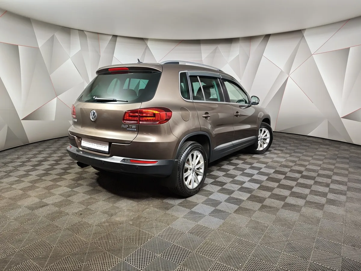 Volkswagen Tiguan 2.0 TSI 4Motion AT (180 л.с.) Sport & Style Коричневый в АВИЛОН. Слайд №2
