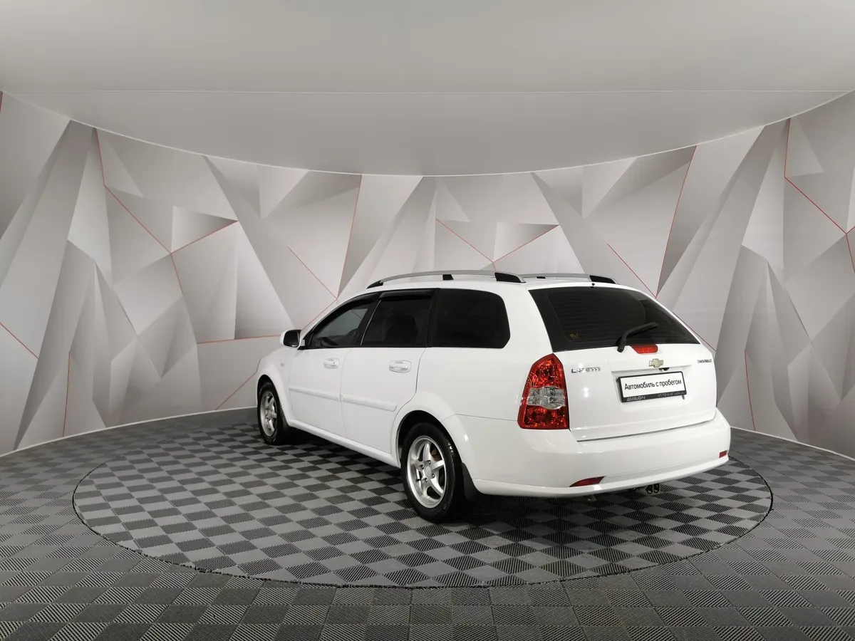 Chevrolet Lacetti 1.6 MT (109 л.с.) Белый в АВИЛОН. Слайд №4
