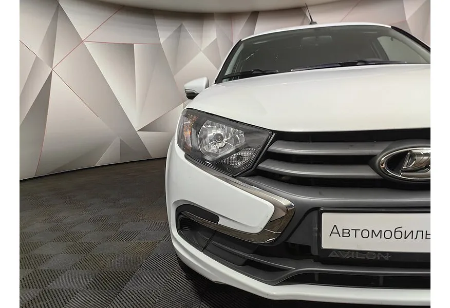 ВАЗ (Lada) Granta 1.6 MT 16 кл (106 л.с.) Белый в АВИЛОН. Слайд №15