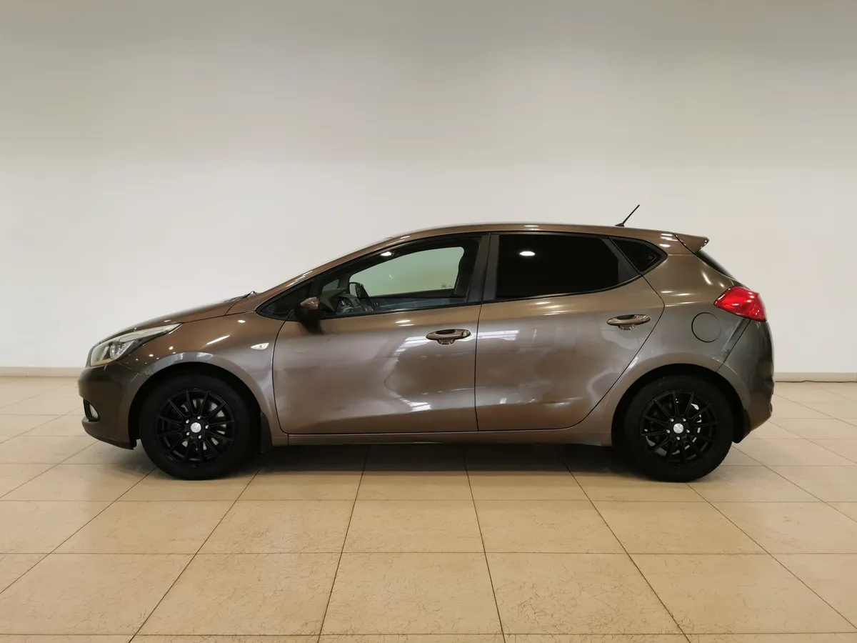 Kia Ceed 1.6 AT (129 л.с.) Коричневый в АВИЛОН. Слайд №5