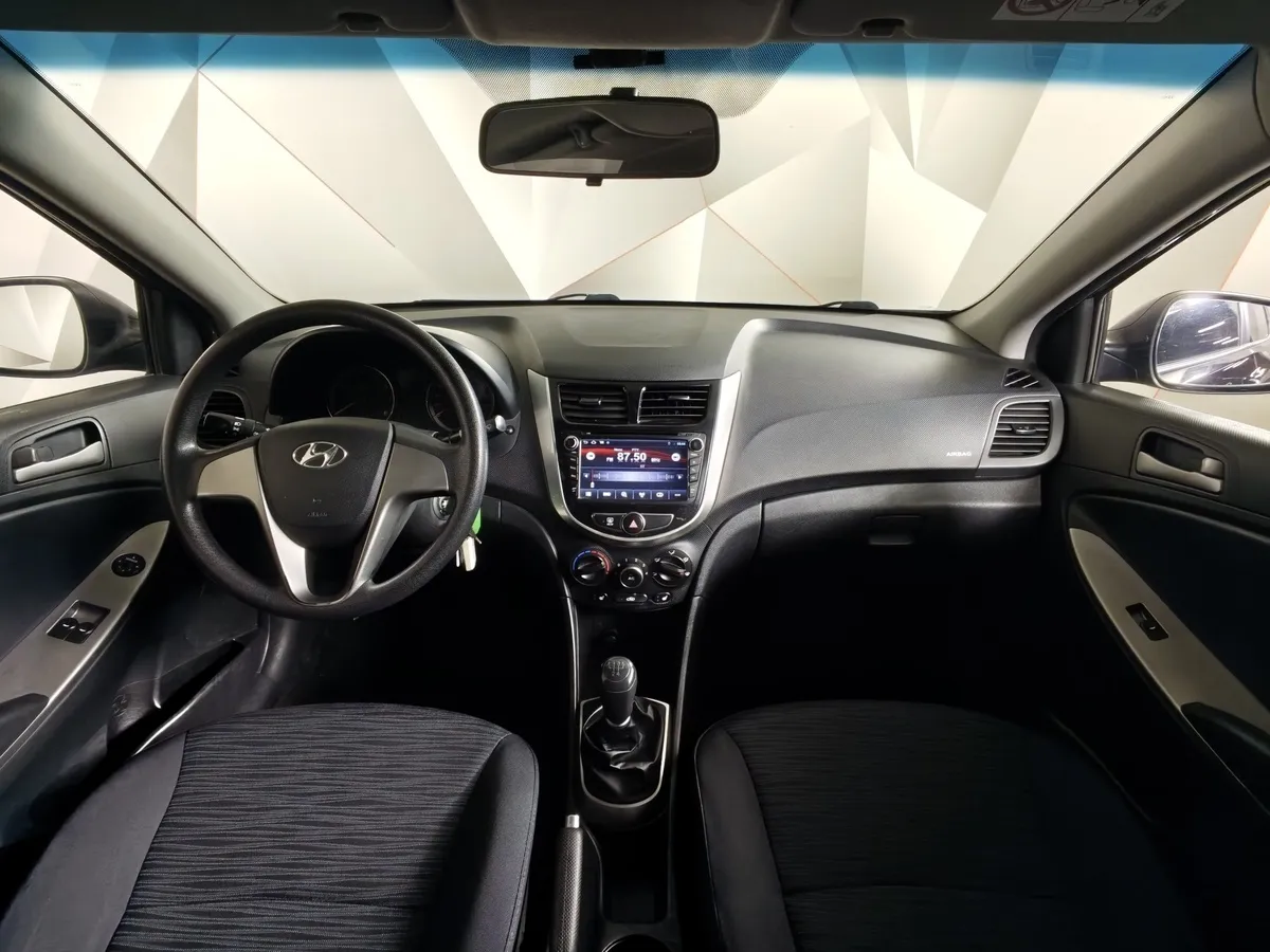 Hyundai Solaris 1.4 MT (107 л.с.) Comfort Черный в АВИЛОН. Слайд №14