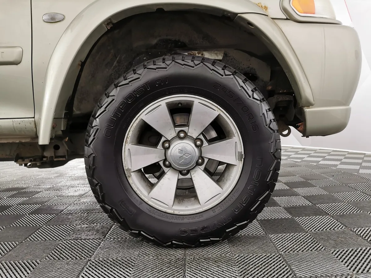 Mitsubishi Pajero Sport 3.0 AT (170 л.с.) Бежевый в АВИЛОН. Слайд №9