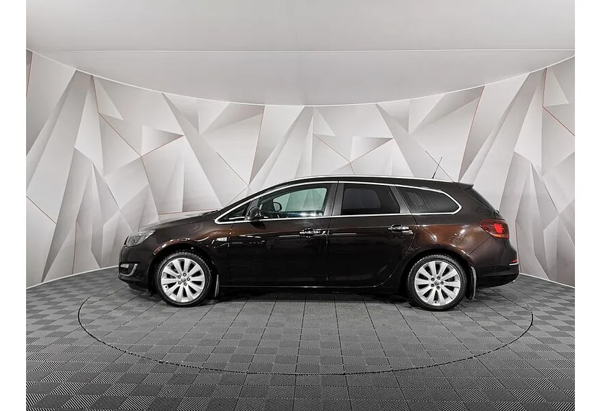 Opel Astra 1.4 Turbo AT (140 л.с.) Коричневый в АВИЛОН. Слайд №5