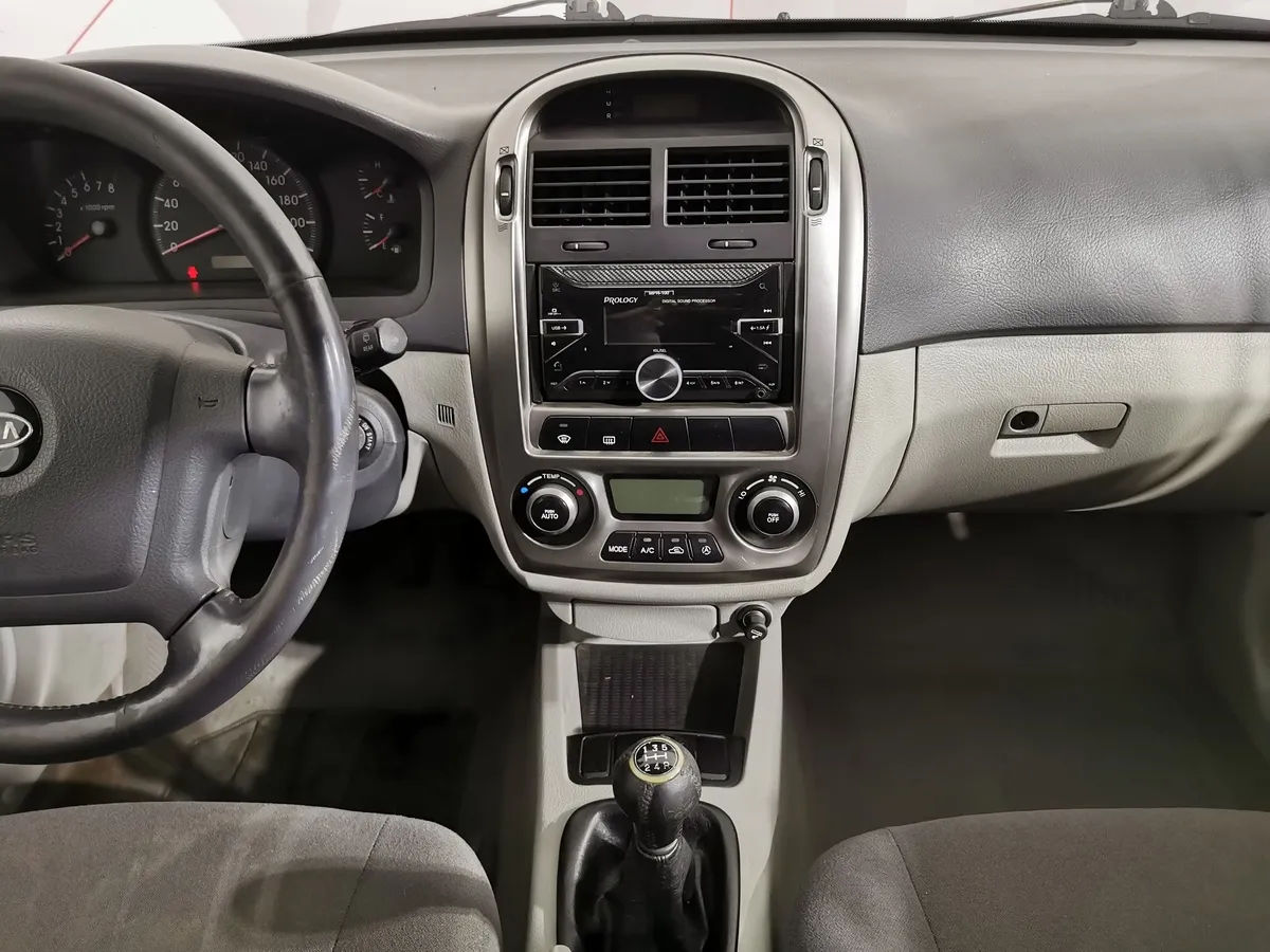 Kia Cerato 1.6 MT (105 л.с.) Серебристый в АВИЛОН. Слайд №13
