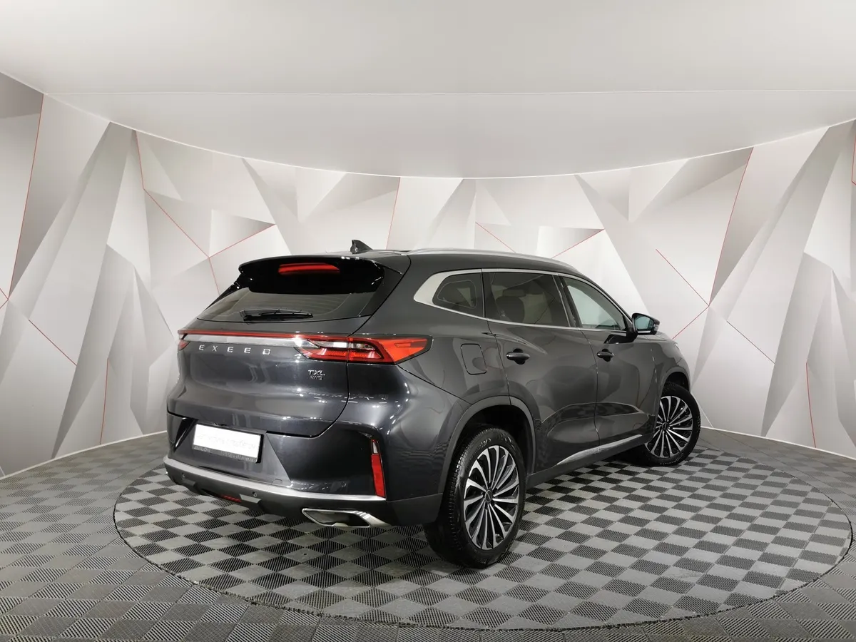EXEED TXL 1.6 TGDI DCT7 AWD (186 л.с.) Серый в АВИЛОН. Слайд №2