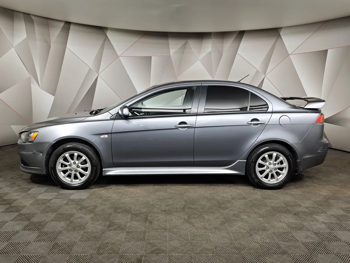 Mitsubishi Lancer 1.6 AT (117 л.с.) Серый в АВИЛОН. Слайд №5