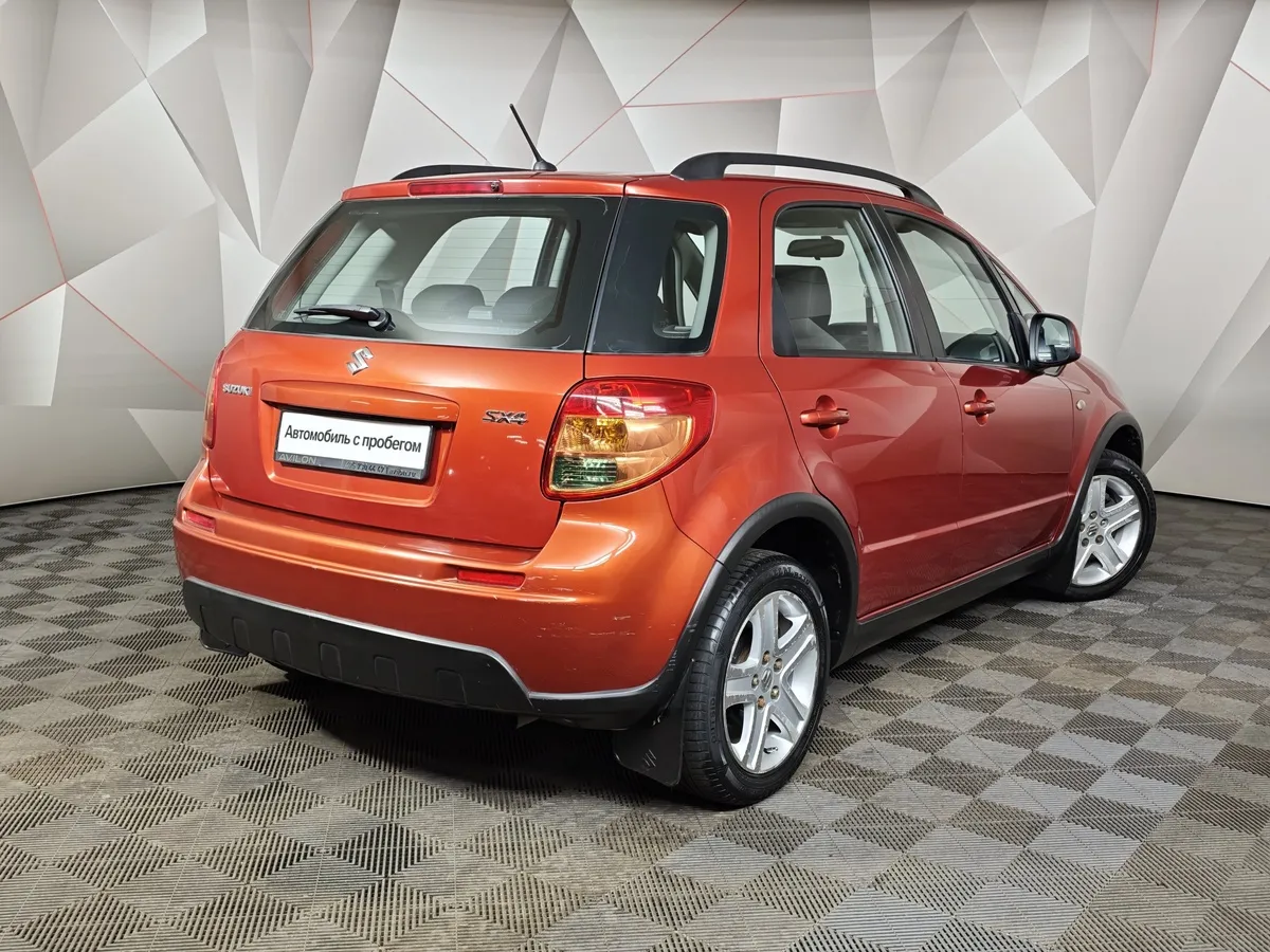 Suzuki SX4 1.6 MT (107 л.с.) Оранжевый в АВИЛОН. Слайд №2