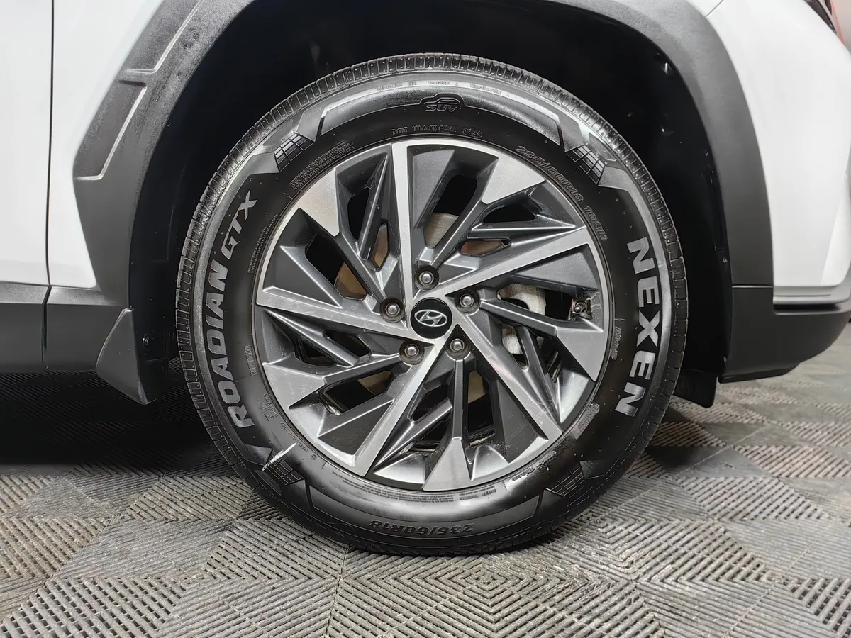 Hyundai Tucson 2.0 AT 4WD (150 л.с.) Comfort Белый в АВИЛОН. Слайд №9