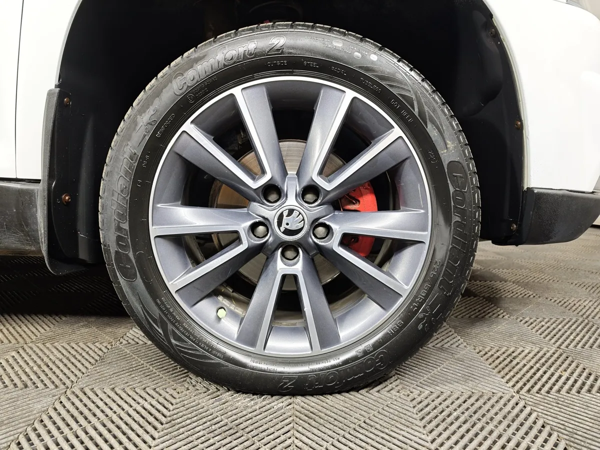 Skoda Yeti 1.8 TSI 4x4 DSG (152 л.с.) Белый в АВИЛОН. Слайд №9