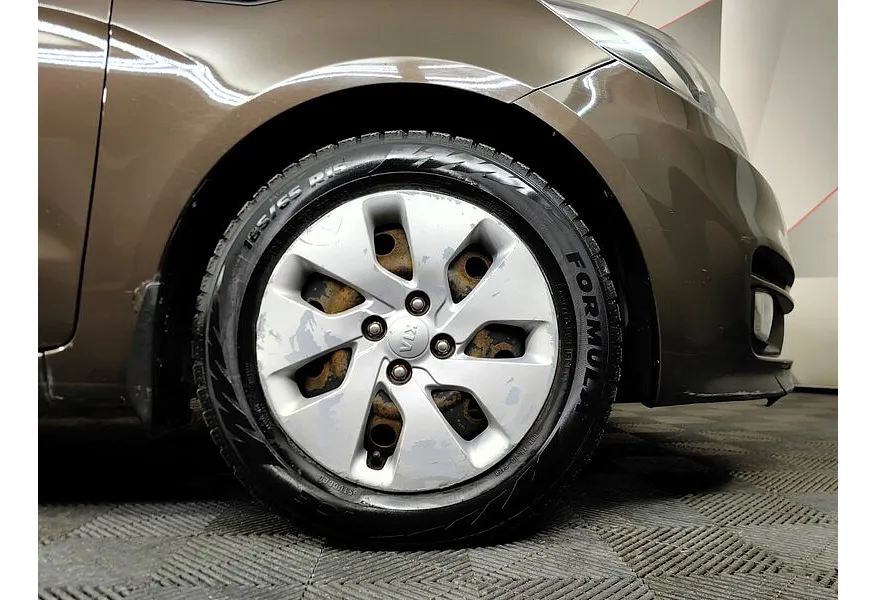 Kia Rio 1.4 AT (107 л.с.) Коричневый в АВИЛОН. Слайд №9