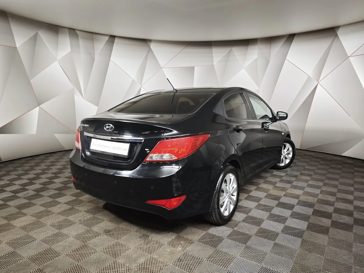 Hyundai Solaris 1.4 AT (107 л.с.) Style Черный в АВИЛОН. Слайд №2