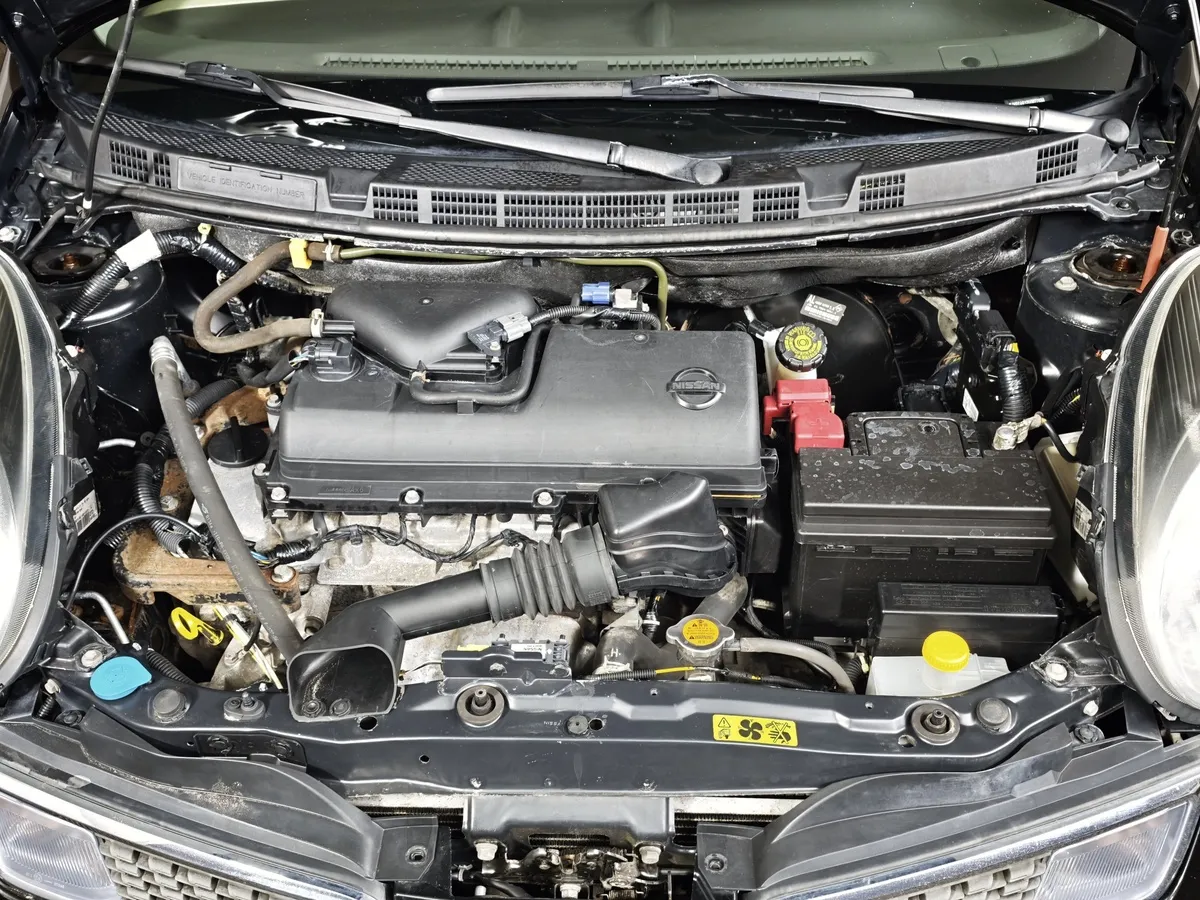 Nissan Micra 1.4 AT (88 л.с.) Черный в АВИЛОН. Слайд №10
