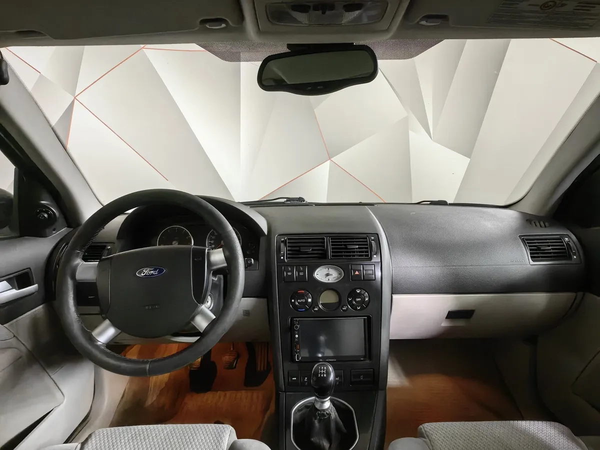 Ford Mondeo 2.0 MT (145 л.с.) Серый в АВИЛОН. Слайд №11