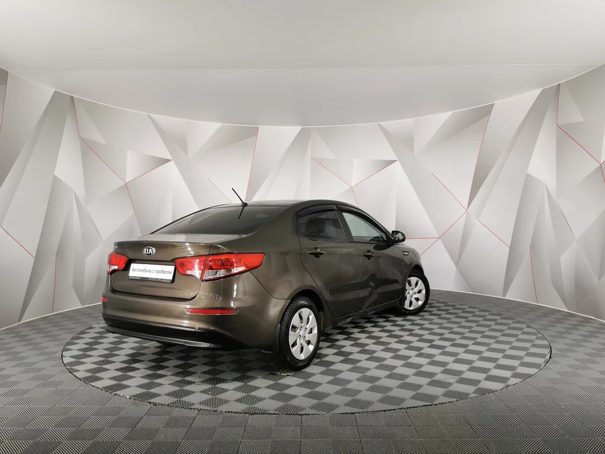 Kia Rio 1.6 AT (123 л.с.) Коричневый в АВИЛОН. Слайд №2