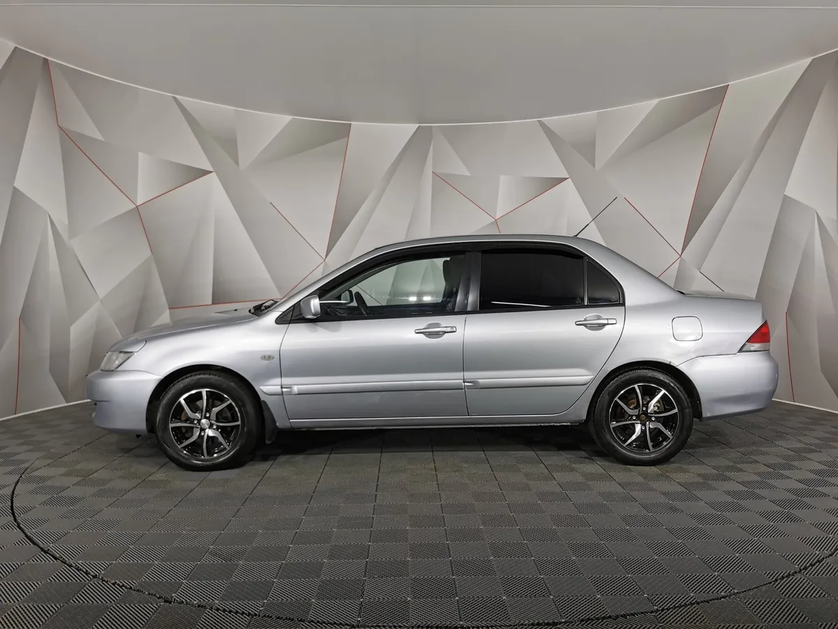 Mitsubishi Lancer 1.6 MT (98 л.с.) Серый в АВИЛОН. Слайд №5