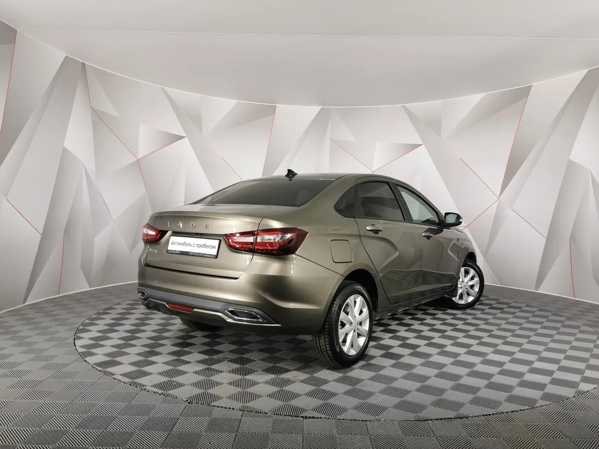 ВАЗ (Lada) Vesta 1.8 MT (122 л.с.) Коричневый в АВИЛОН. Слайд №2