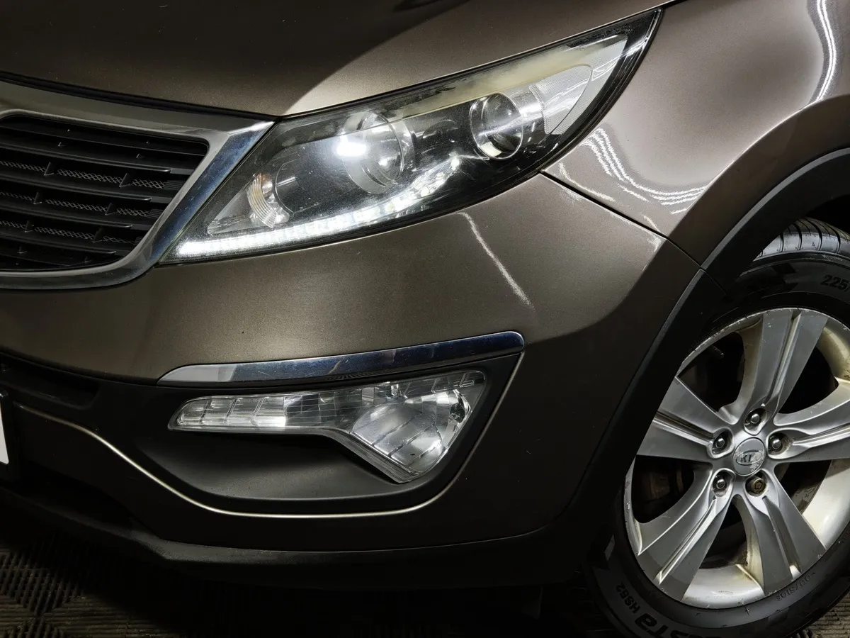 Kia Sportage 2.0 AT 4WD (150 л.с.) Luxe Коричневый в АВИЛОН. Слайд №10