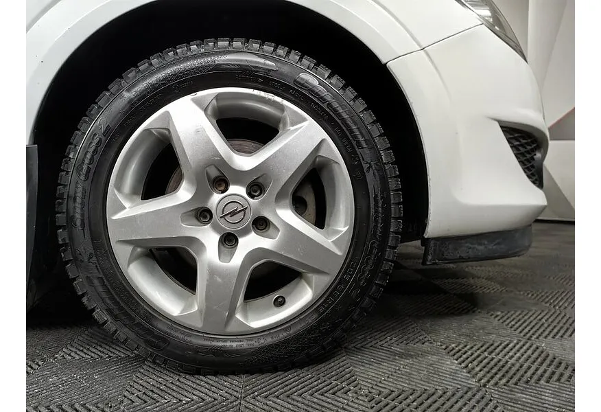 Opel Astra 1.8 AT (140 л.с.) base Белый в АВИЛОН. Слайд №9