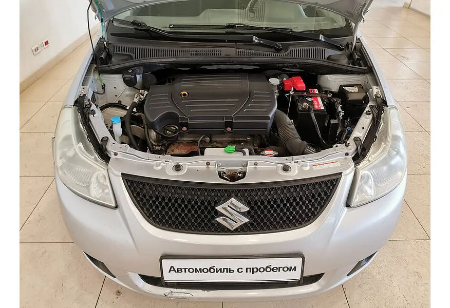Suzuki SX4 1.6 MT (107 л.с.) Серебристый в АВИЛОН. Слайд №10
