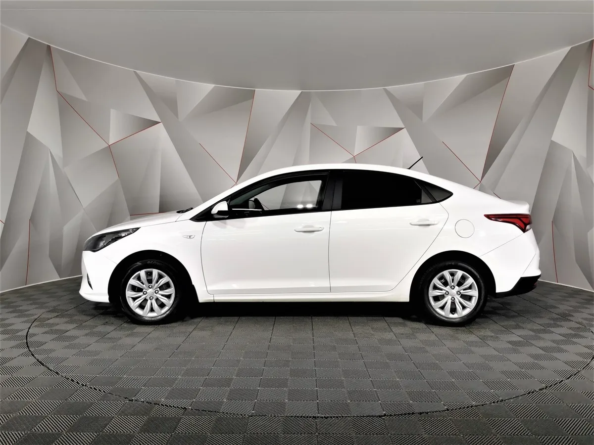 Hyundai Solaris 1.6 MT (123 л.с.) Comfort Белый в АВИЛОН. Слайд №5