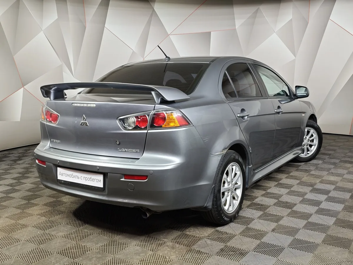 Mitsubishi Lancer 1.6 AT (117 л.с.) Серый в АВИЛОН. Слайд №2