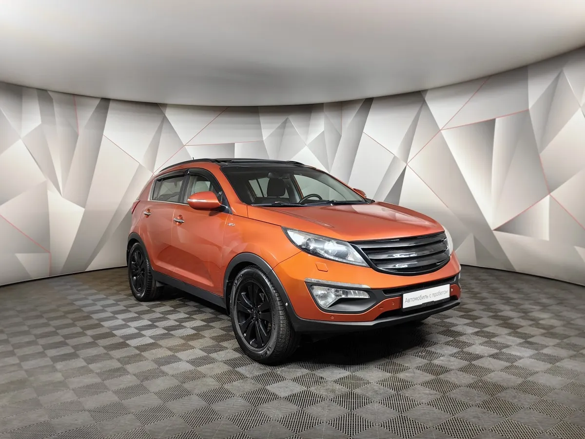Kia Sportage 2.0 AT AWD (150 л.с.) Оранжевый в АВИЛОН. Слайд №3