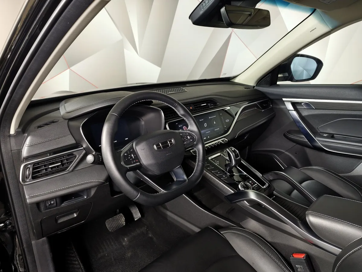 Geely Atlas Pro 1.5T 7DCT AWD (177 л.с.) Flagship Черный в АВИЛОН. Слайд №18