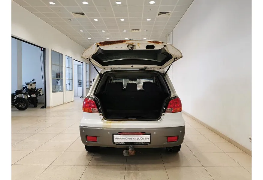 Mitsubishi Outlander 2.4 AT 4WD (160 л.с.) Белый в АВИЛОН. Слайд №11