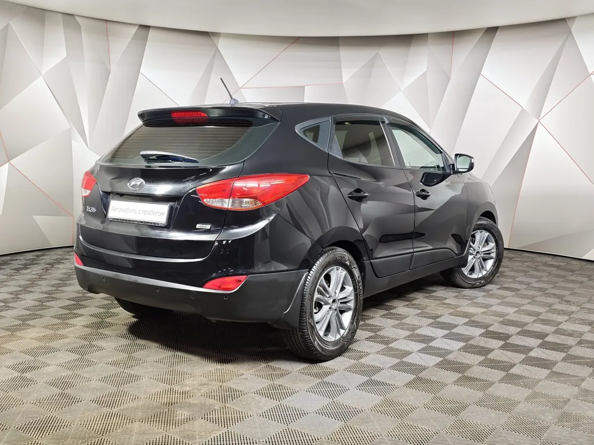 Hyundai ix35 2.0 AT 4WD (150 л.с.) Comfort Черный в АВИЛОН. Слайд №2